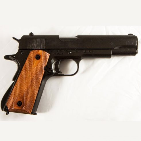 Pistola automática 45 M1911 A1 Fabricada por Colt USA Cachas Madera Grabada