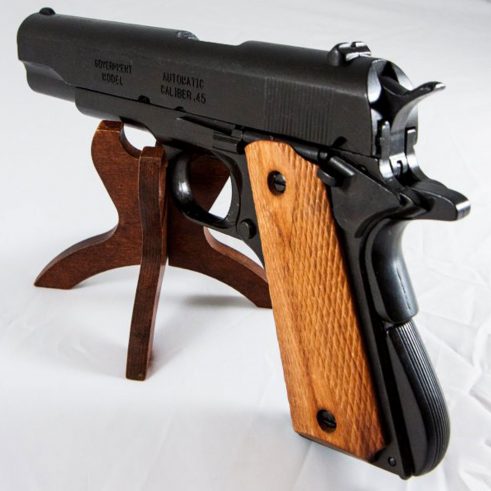 Pistola automática 45 M1911 A1 Fabricada por Colt USA Cachas Madera Grabada