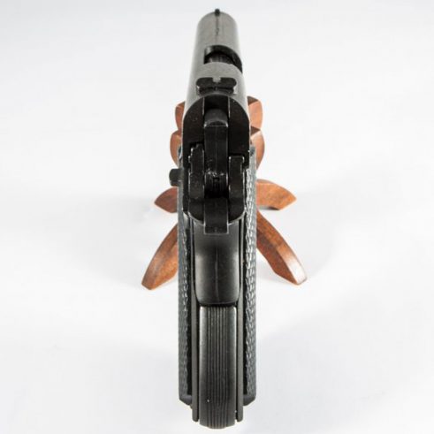 Pistola automática 45 M1911 A1 Fabricada por Colt USA DENIX Cachas Plástico Negro REf 1312