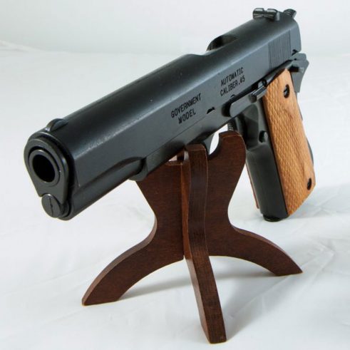 Pistola automática 45 M1911 A1 Fabricada por Colt USA Cachas Madera Grabada