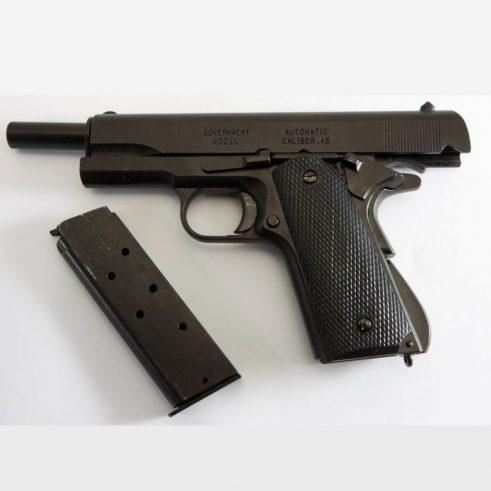 Pistola automática 45 M1911 A1 Fabricada por Colt USA DENIX Cachas Plástico Negro REf 1312